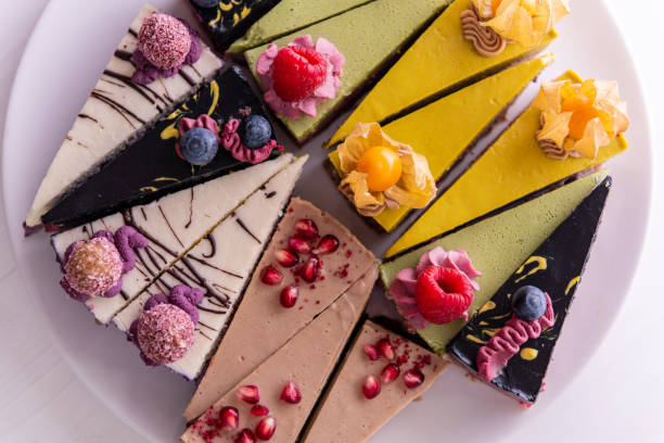 Random selection of healthy vegan raw colorful fruit cakes